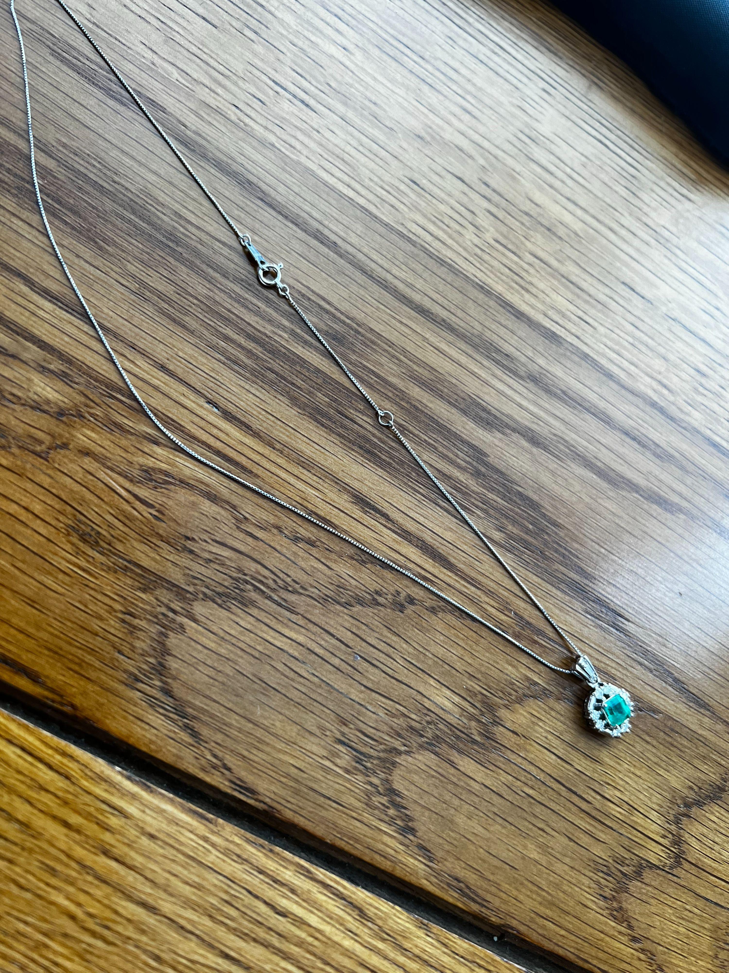 Platinum, emerald & diamond pendant necklace