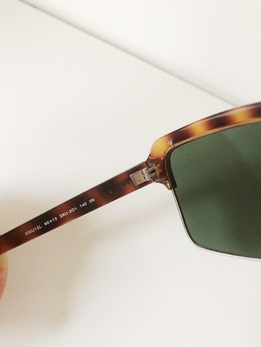 Miu Miu Tortoise Shell Sunglasses