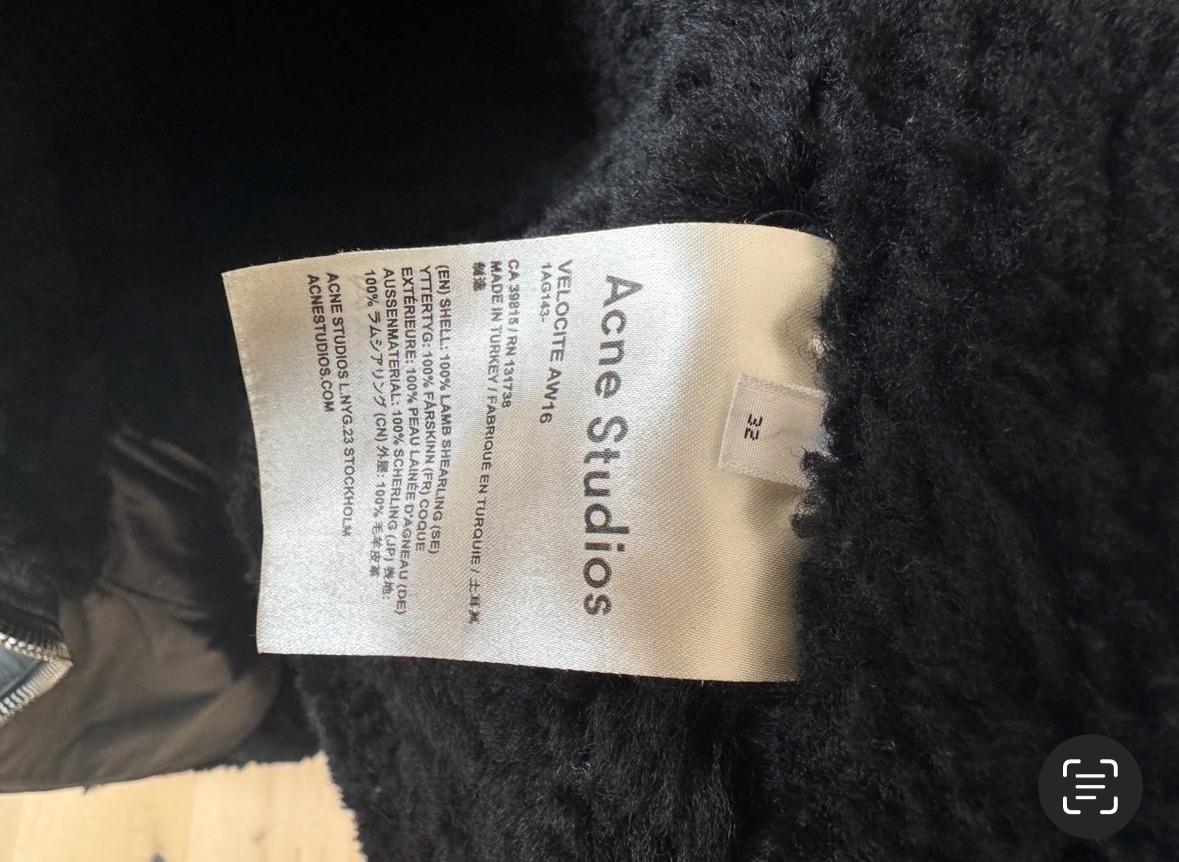 Black Velocite Shearling Jacket.