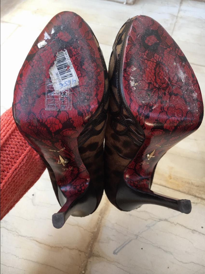 Cesare Paciotti animal print pony hair stiletto pumps