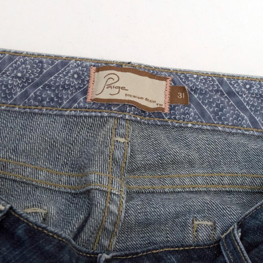 Paige Denim Flared Jeans with Back Pocket Embroidery