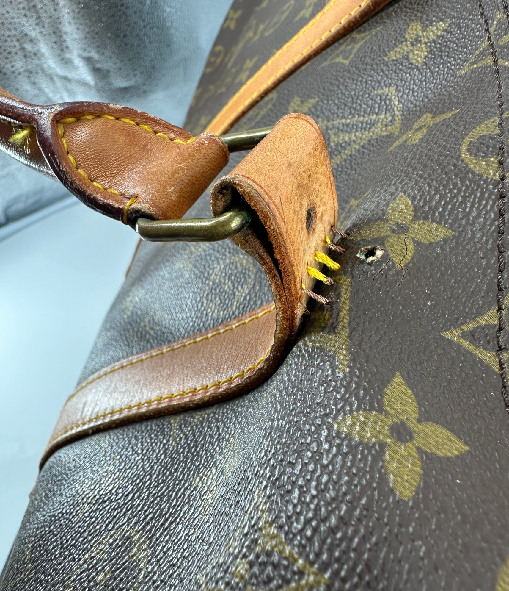 Louis Vuitton Coated Canvas Brown Keepall 55 Bag