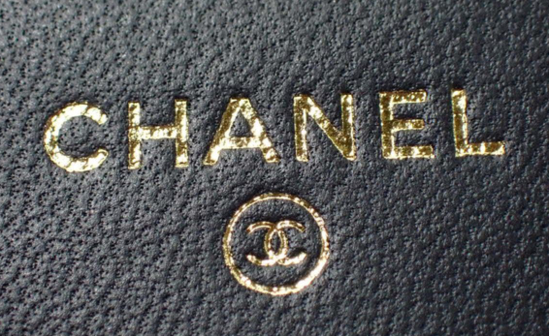 Chanel Quilted Black Leather Mini Flap Bag with Gold Tone Hardware