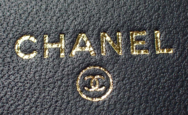Chanel Quilted Black Leather Mini Flap Bag with Gold Tone Hardware