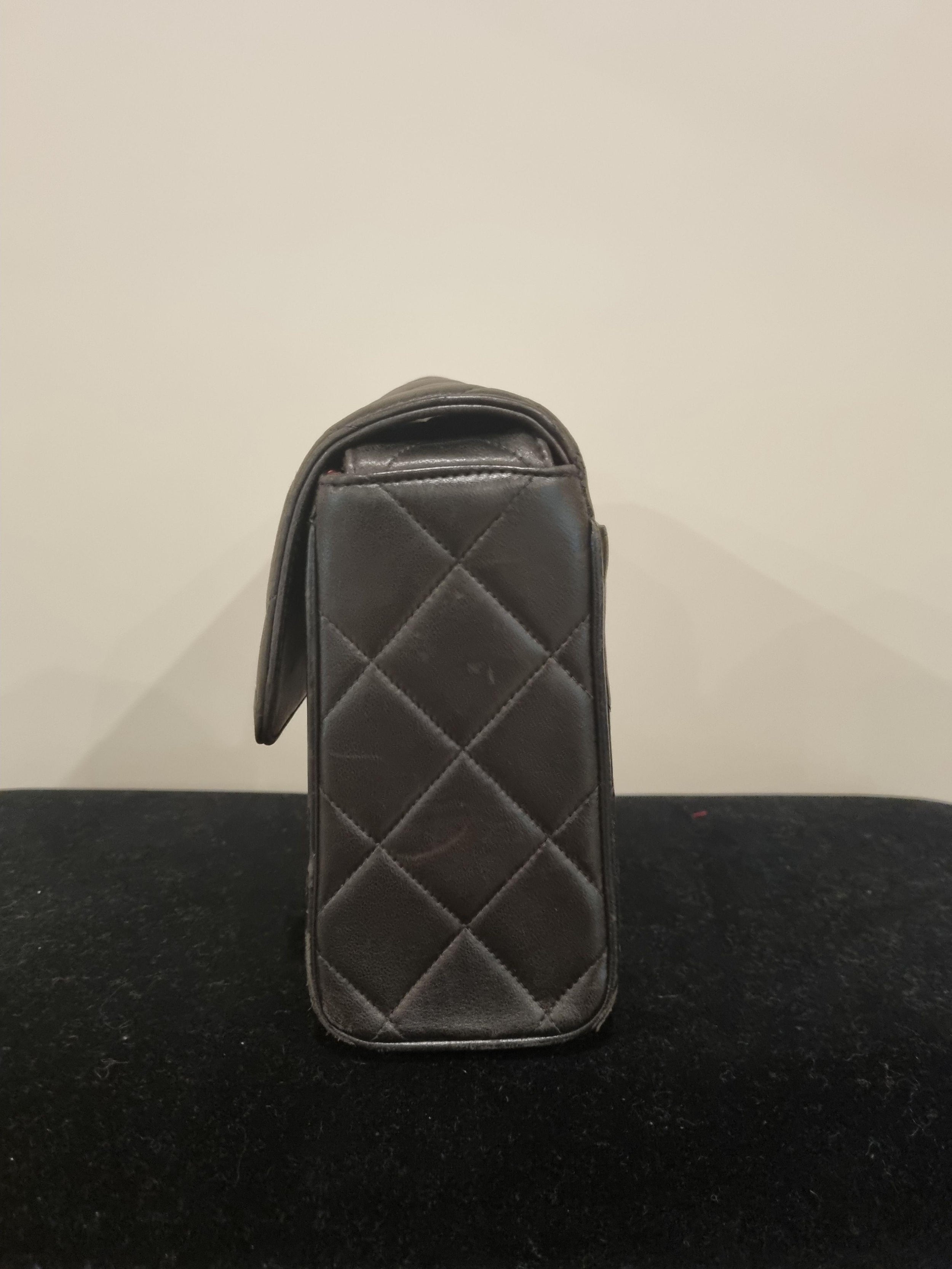 Vintage black leather quilted CC flap bag