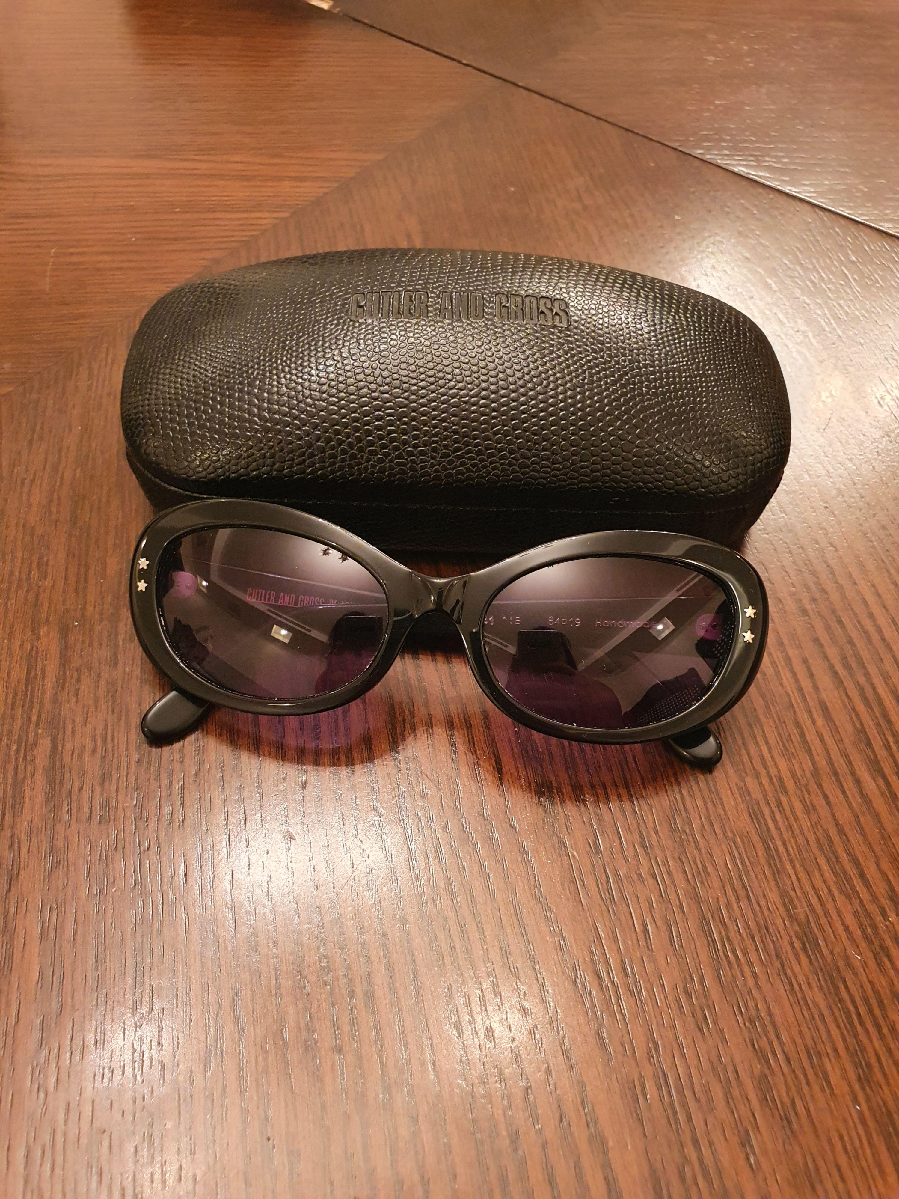 Black acetate oval sunglasses