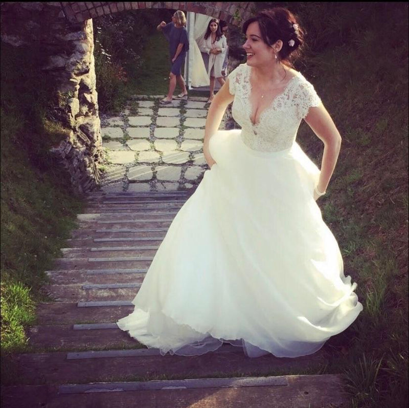 White Lace Body Bridal Gown With Full Skirt And Train