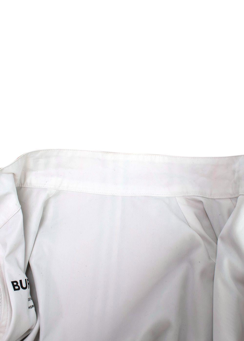 white sports coat with Burberry print