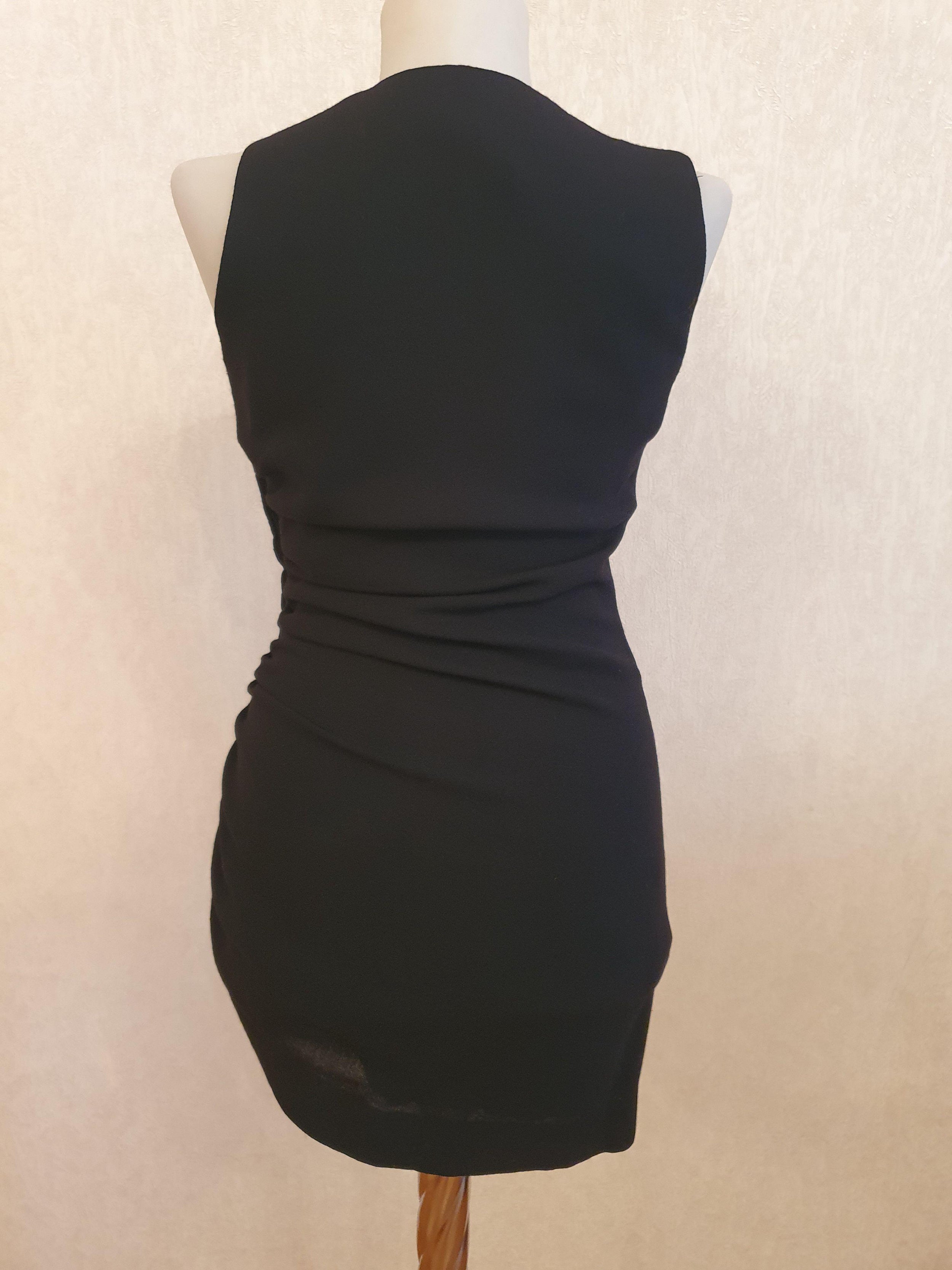 Black wool crepe crystal embellished ruched mini dress