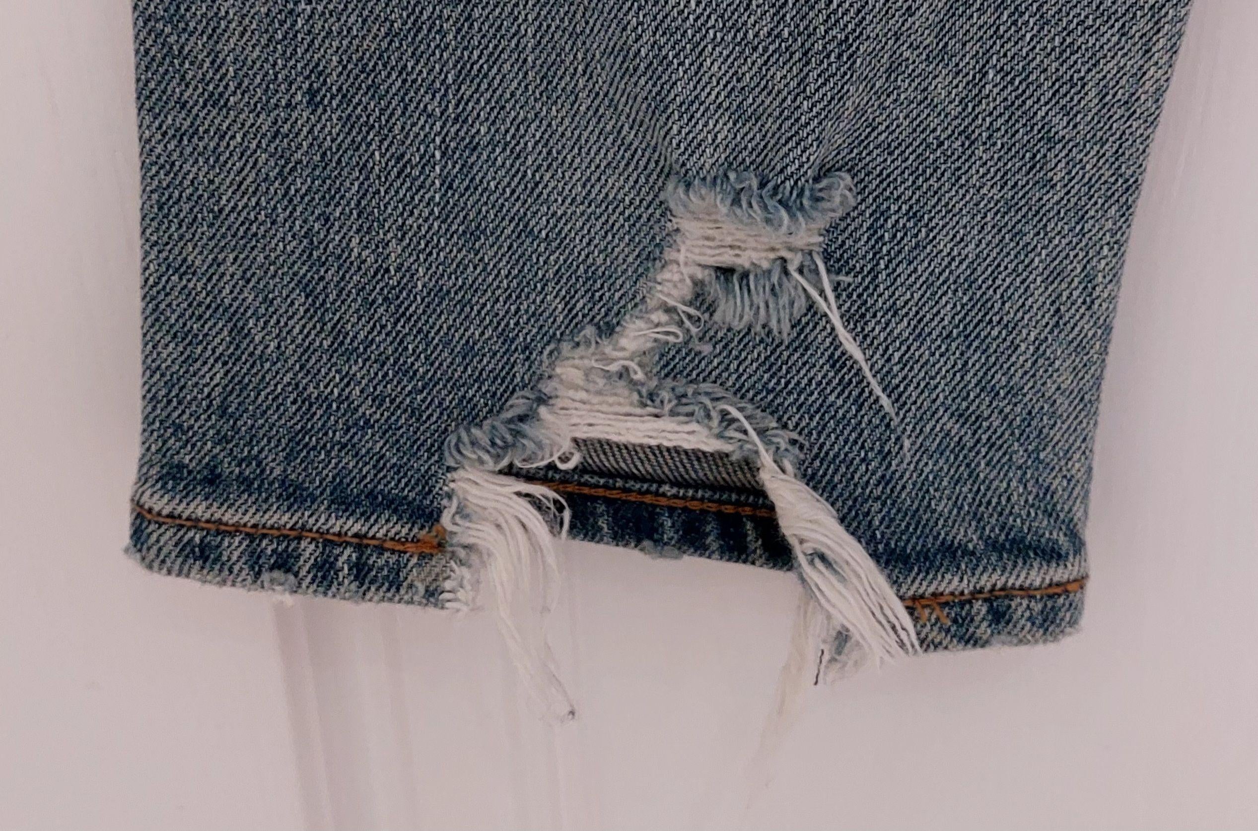 Saint Laurent Washed Denim Distressed Skinny Jeans