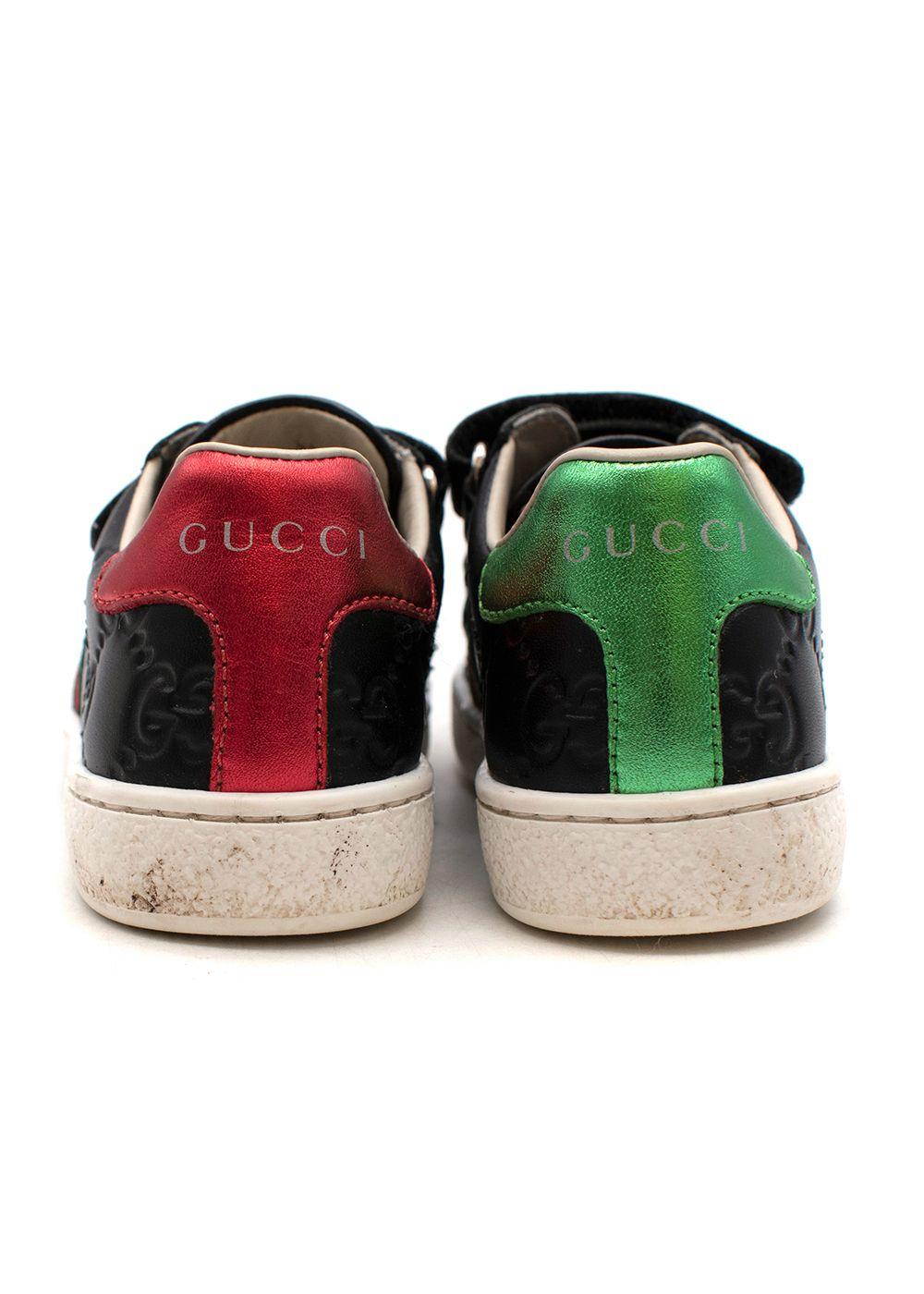 Black GG embossed leather Ace trainers