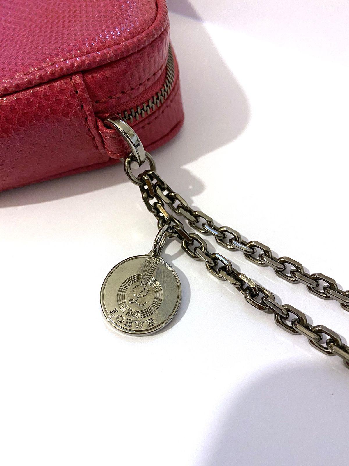 Loewe pink water snake clutch purse with chain