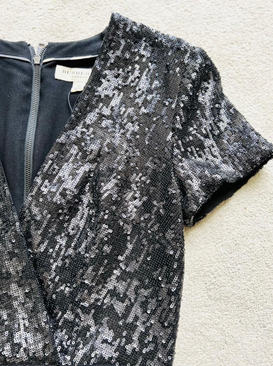 black sequinned crossover dress