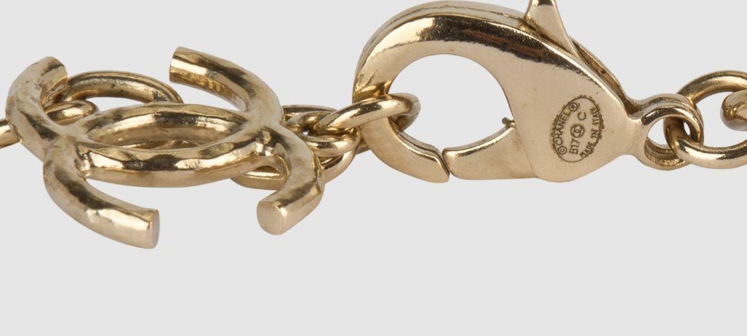 Chanel Gold Tone Letter Necklace