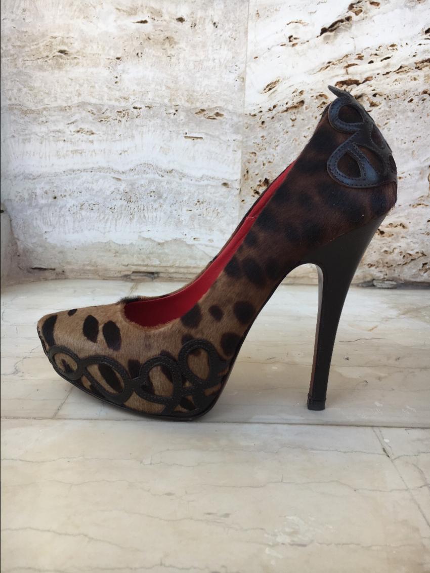 Cesare Paciotti animal print pony hair stiletto pumps