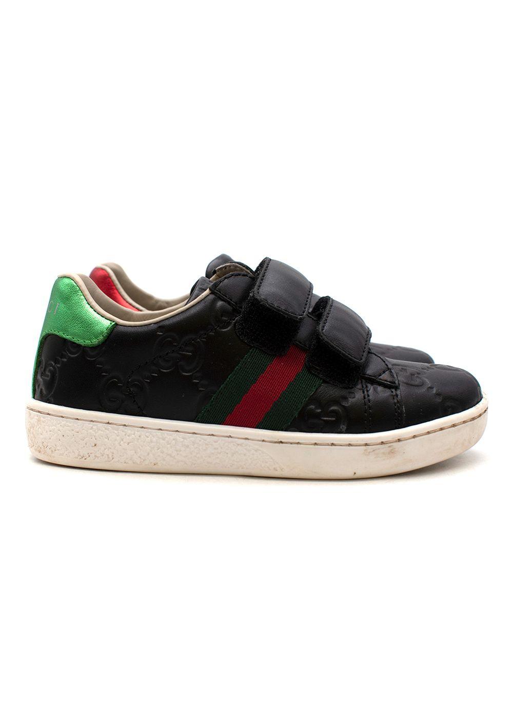 Black GG embossed leather Ace trainers