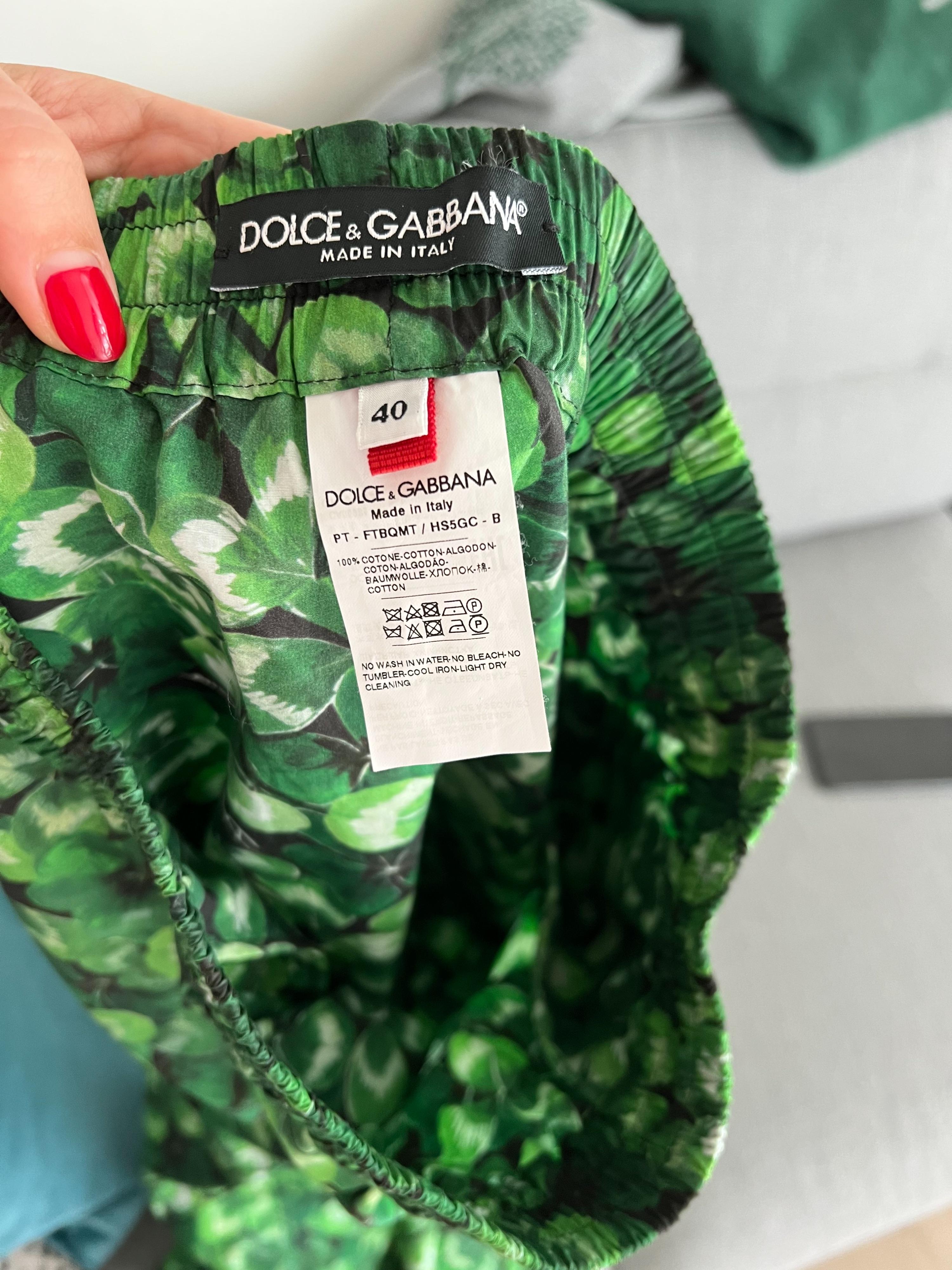 Green clover print cotton trousers