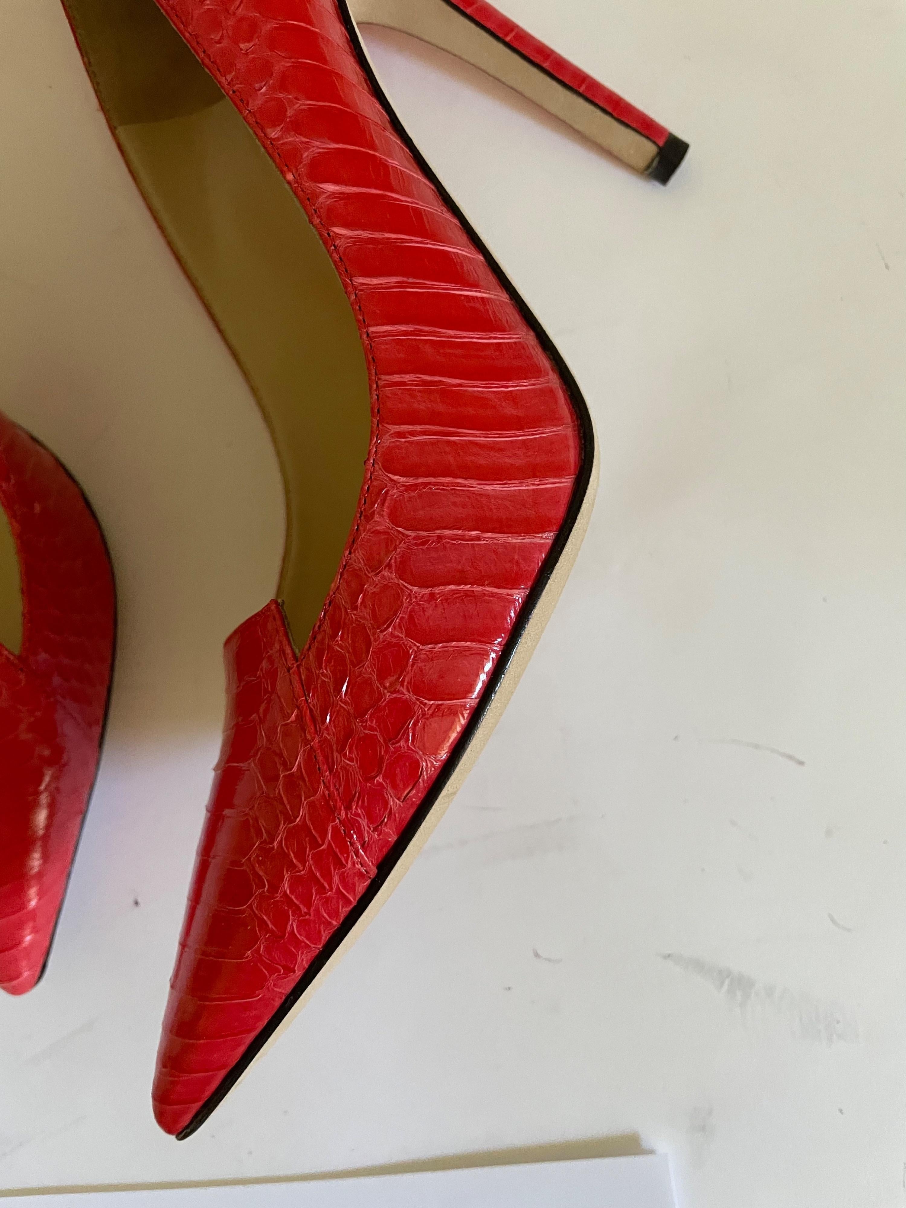Red snakeskin Avril heeled pumps