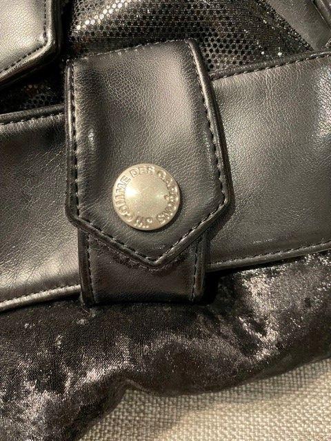 Black faux-leather & fabric patchwork padded biker jacket