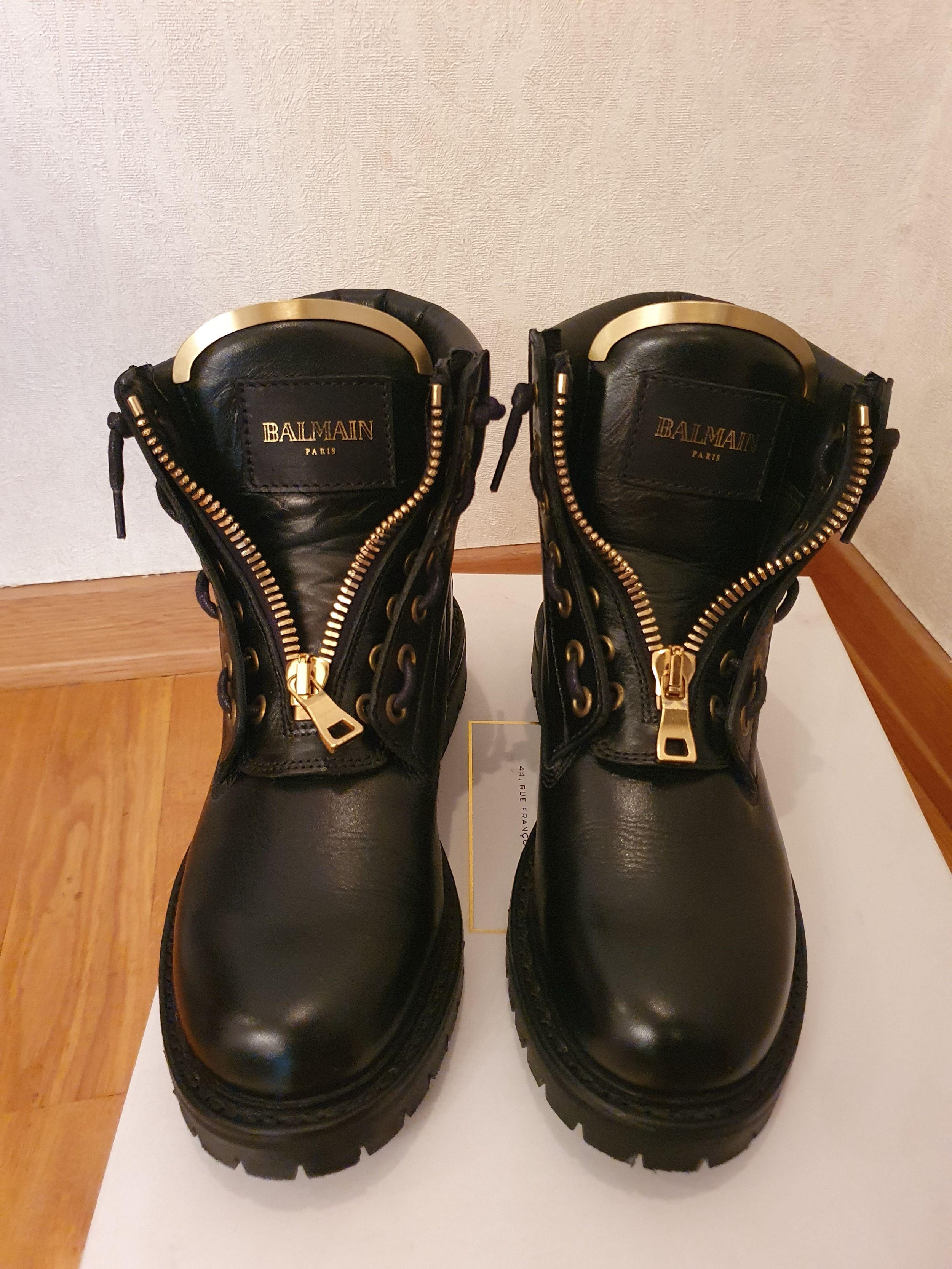 Black leather zip combat boots