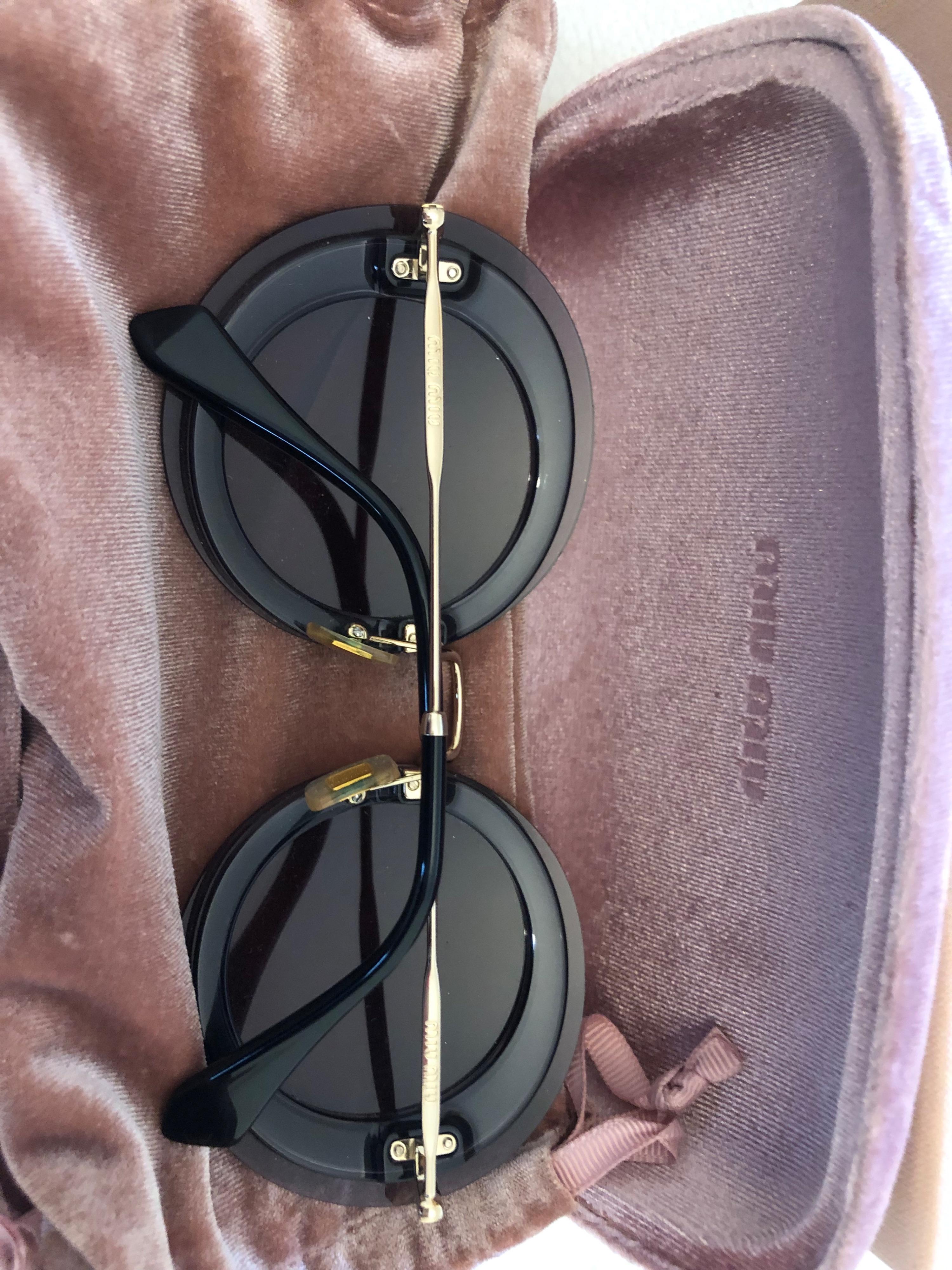 Miu Miu Black Round Sunglasses