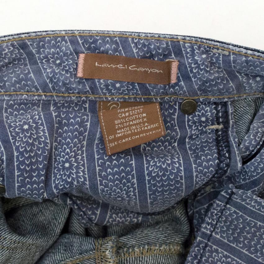 Paige Denim Flared Jeans with Back Pocket Embroidery
