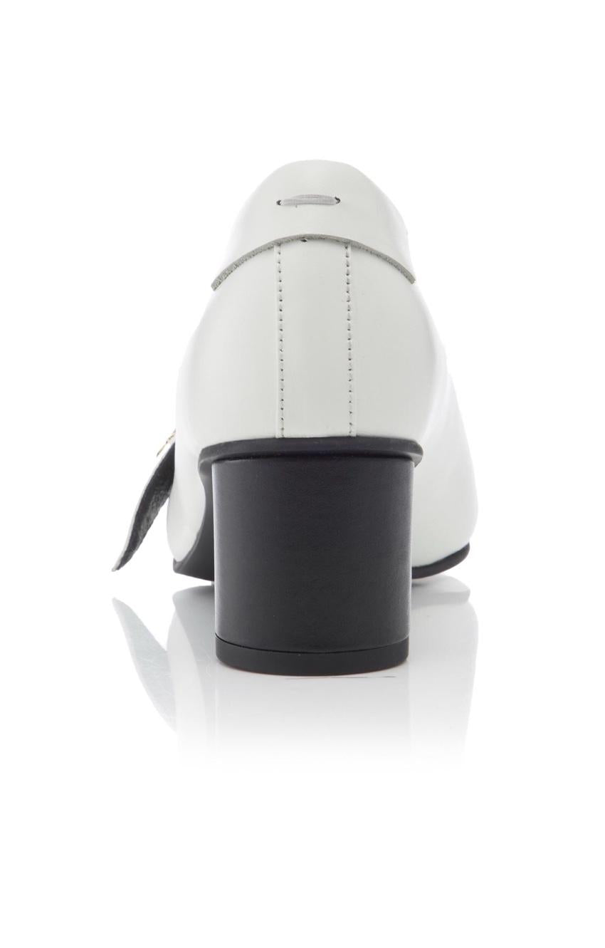 Reike Nen white leather pumps