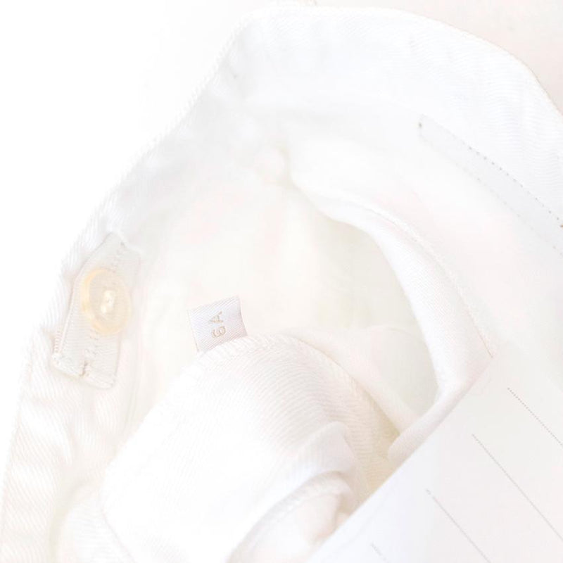 Marie Chantal white trousers