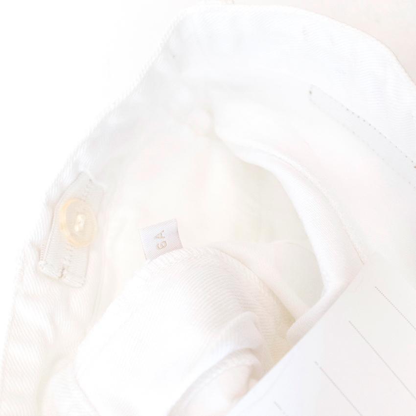 Marie Chantal white trousers