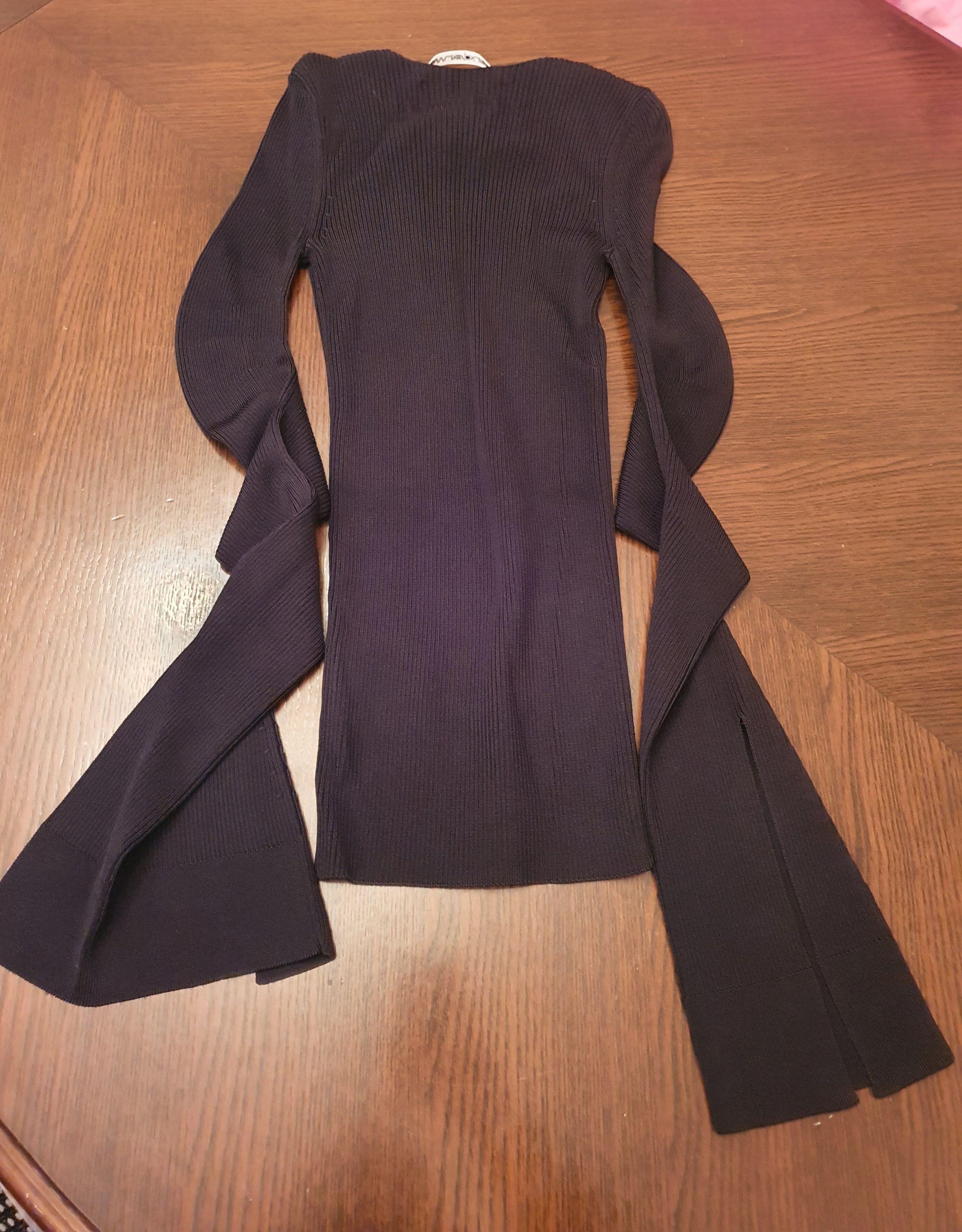 Black ribbed knit chain detail top