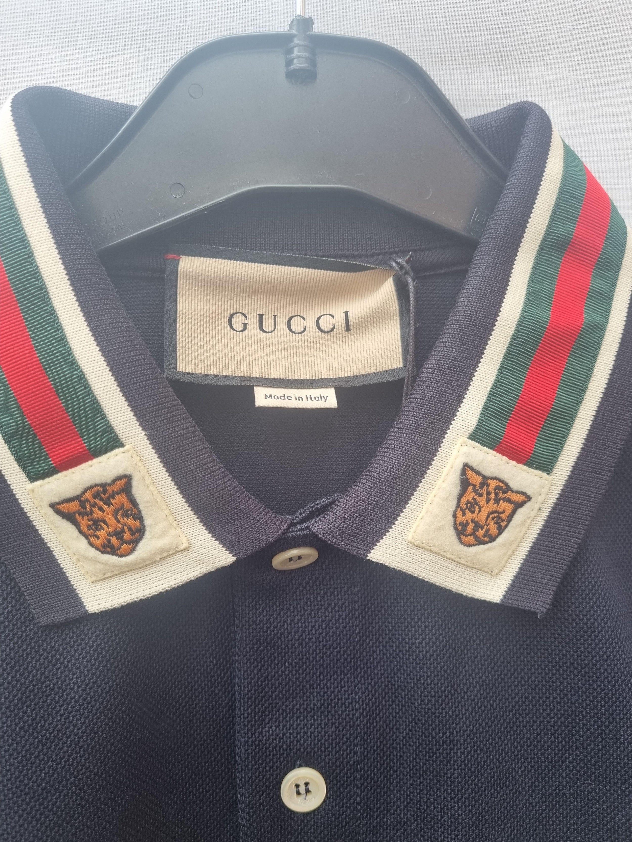 Cotton polo with Web and feline head