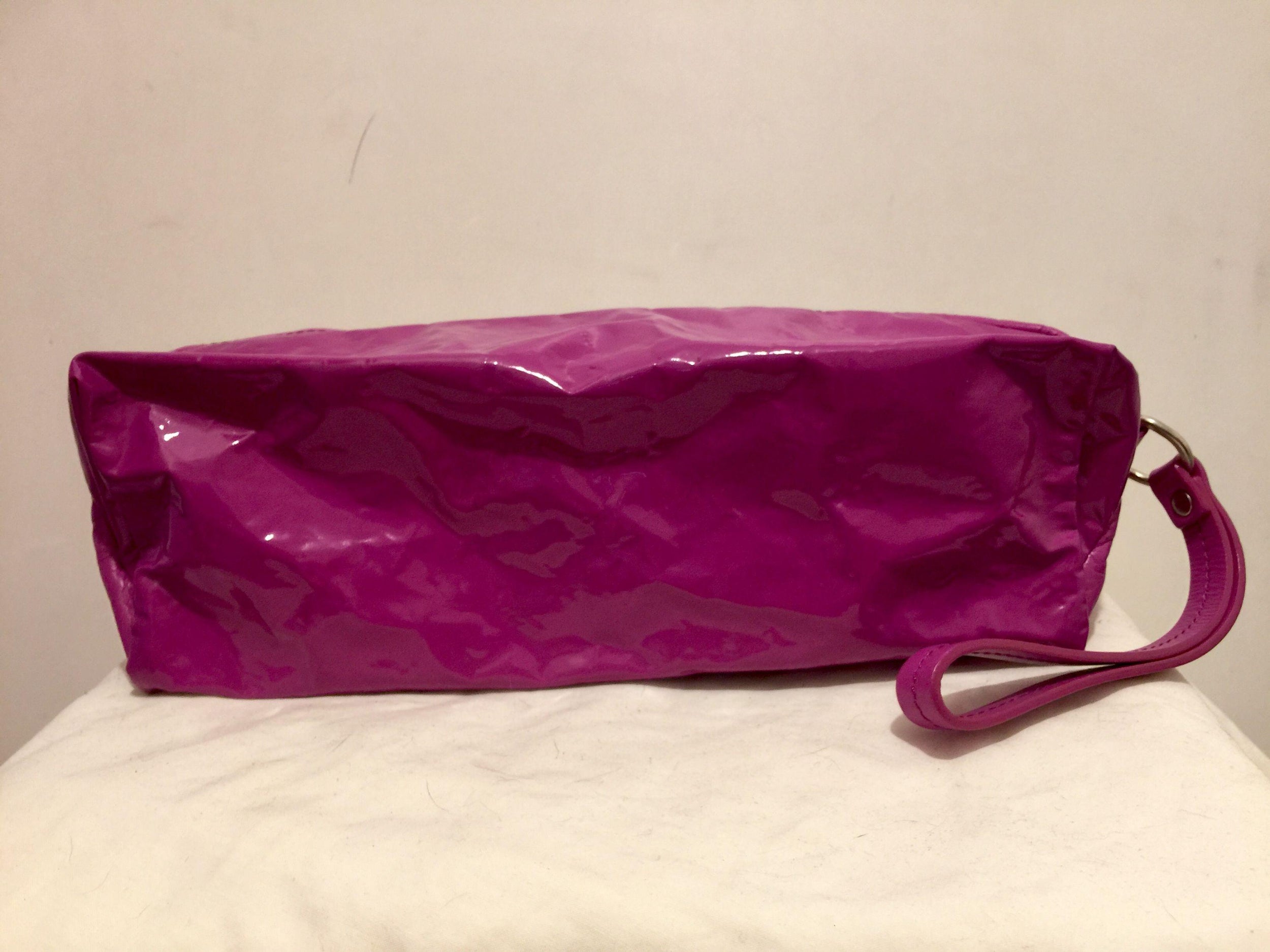 Fuchsia vinyl & leather clutch bag