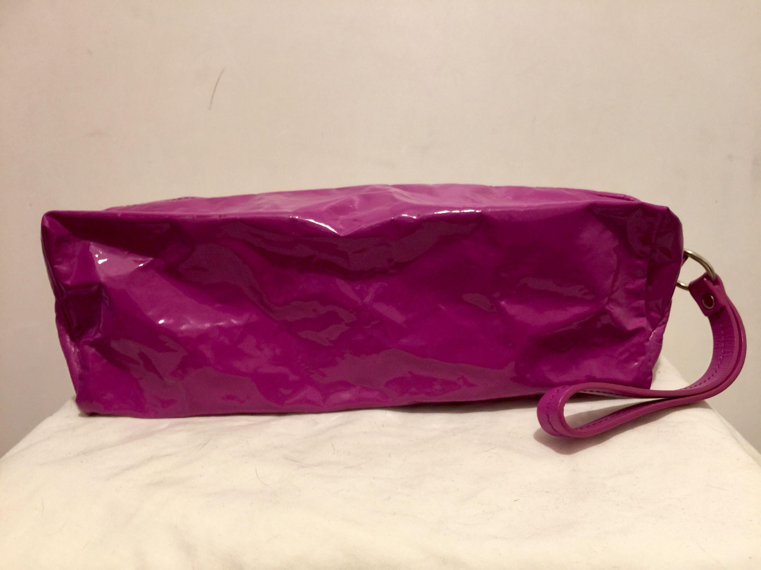 Fuchsia vinyl & leather clutch bag