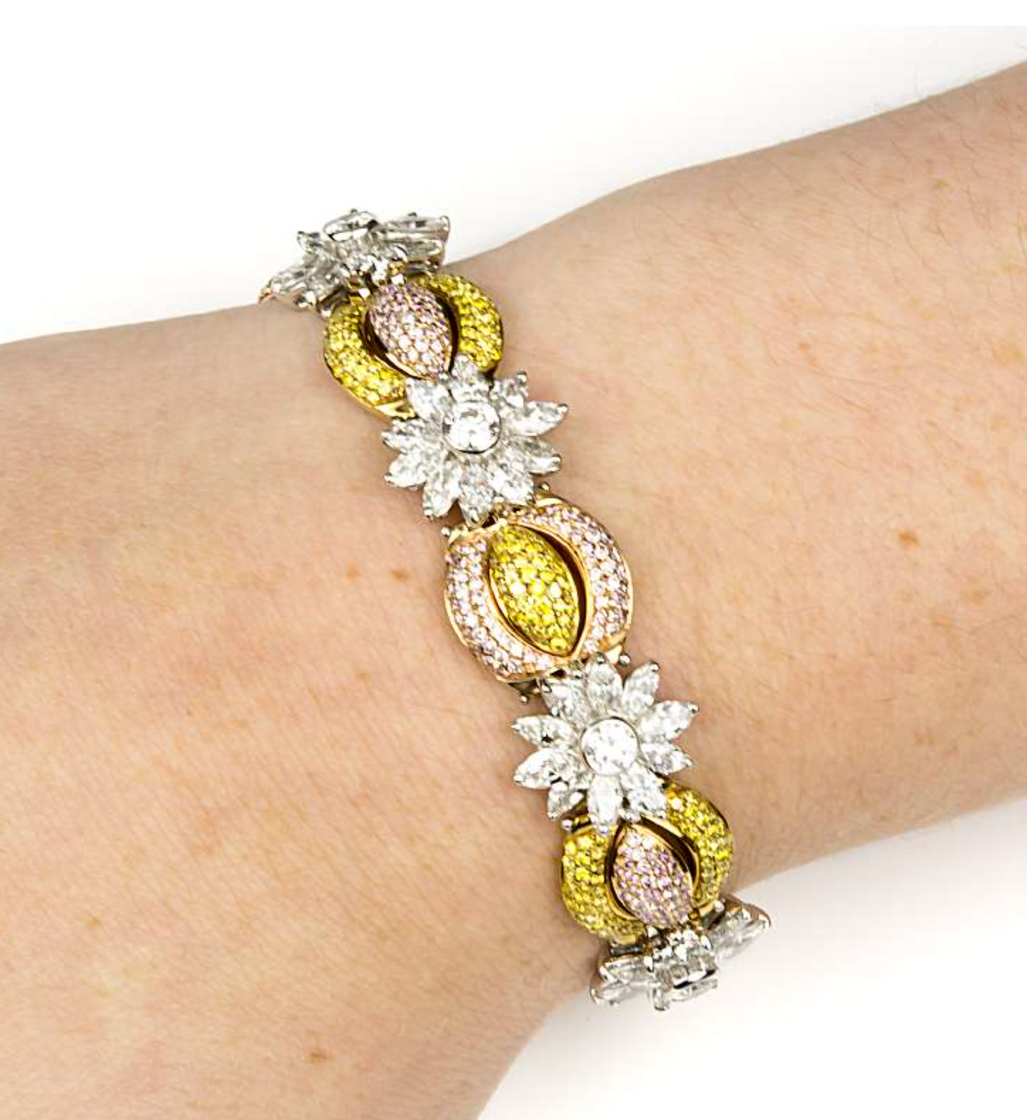 18ct white gold, white, yellow & pink fancy diamond bracelet