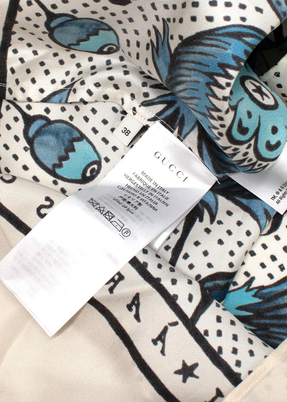 blue/white short sleeve shirt with floral print