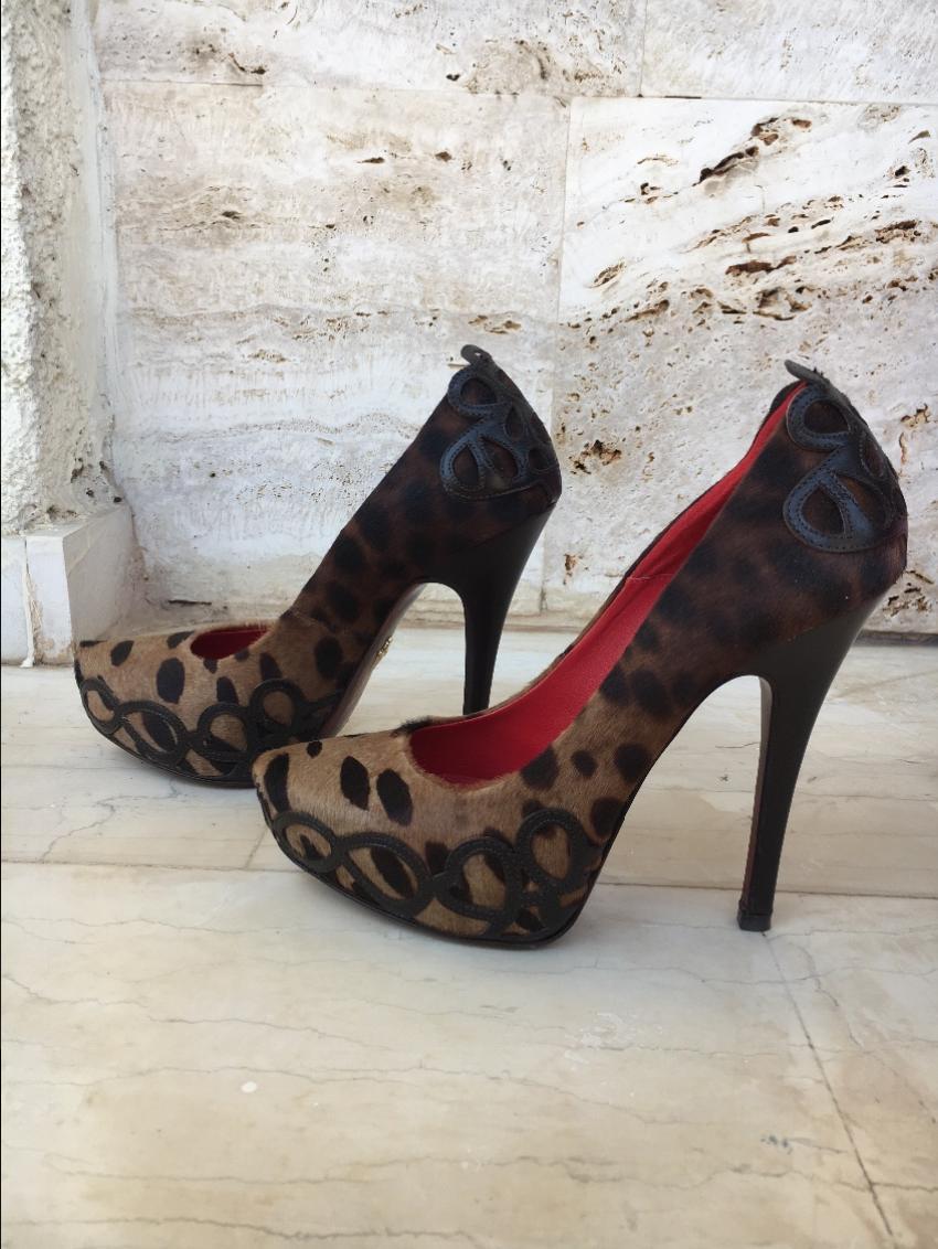 Cesare Paciotti animal print pony hair stiletto pumps
