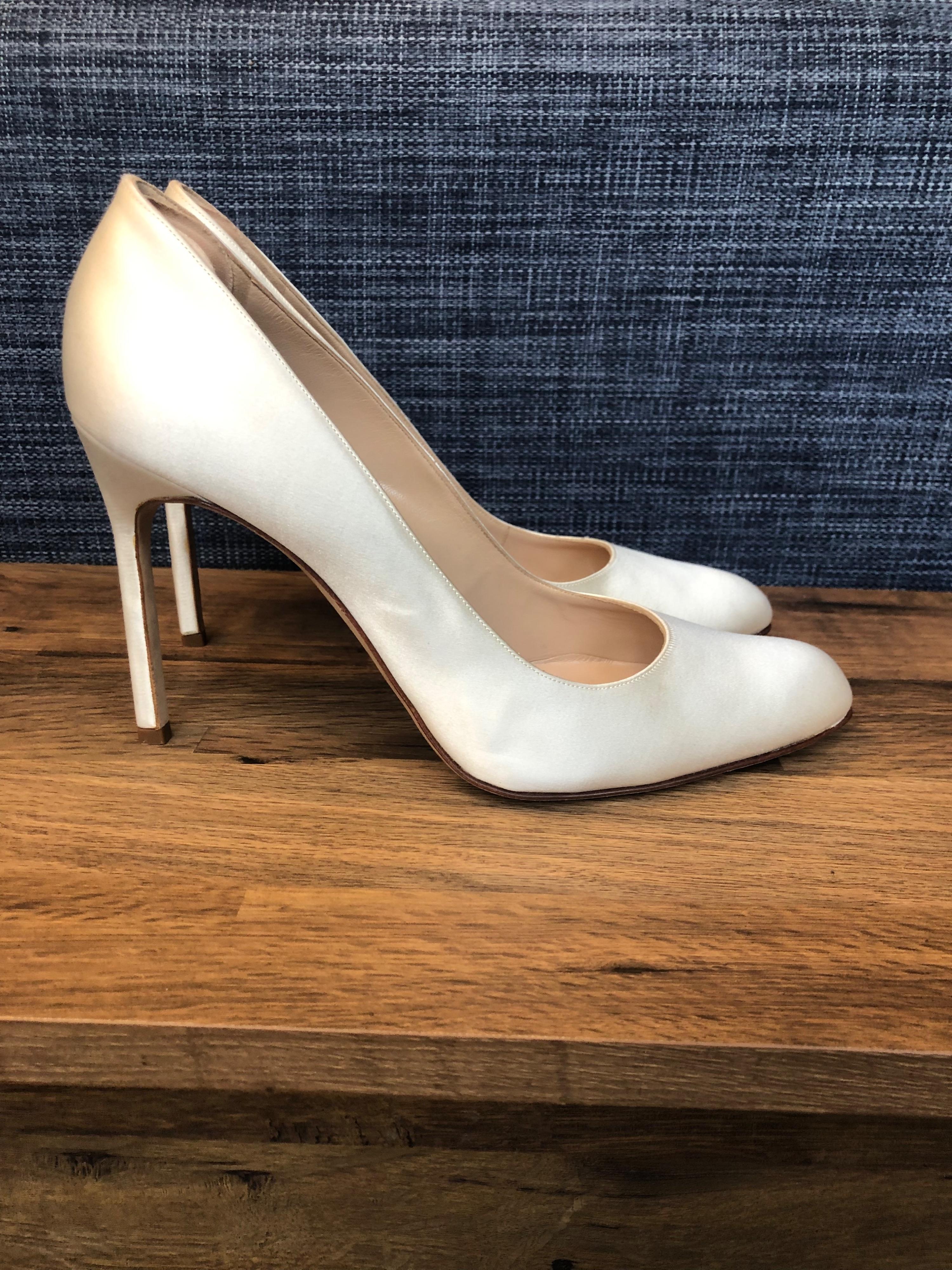 Ivory satin heeled pumps