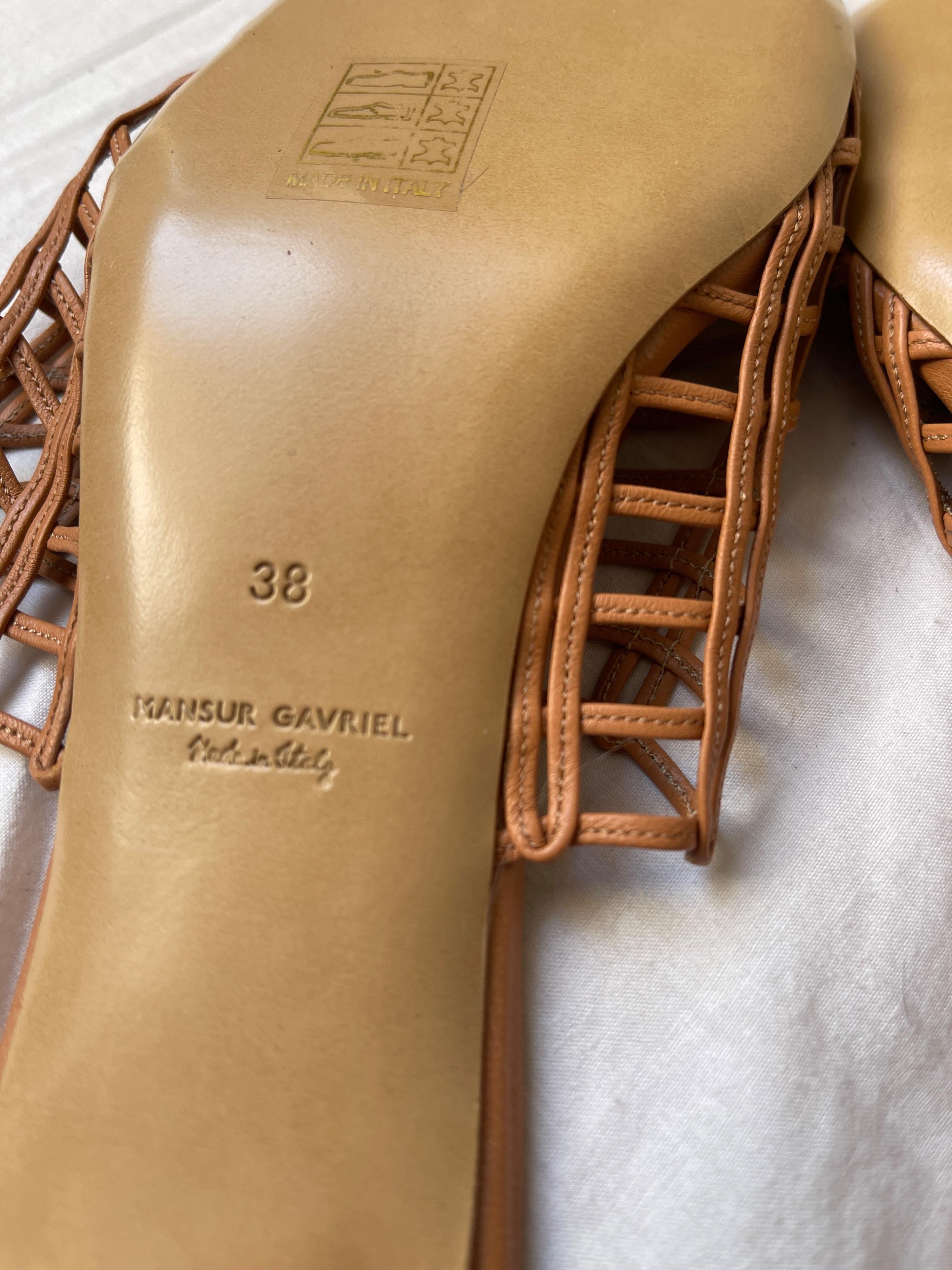 Tan woven leather block heeled mules