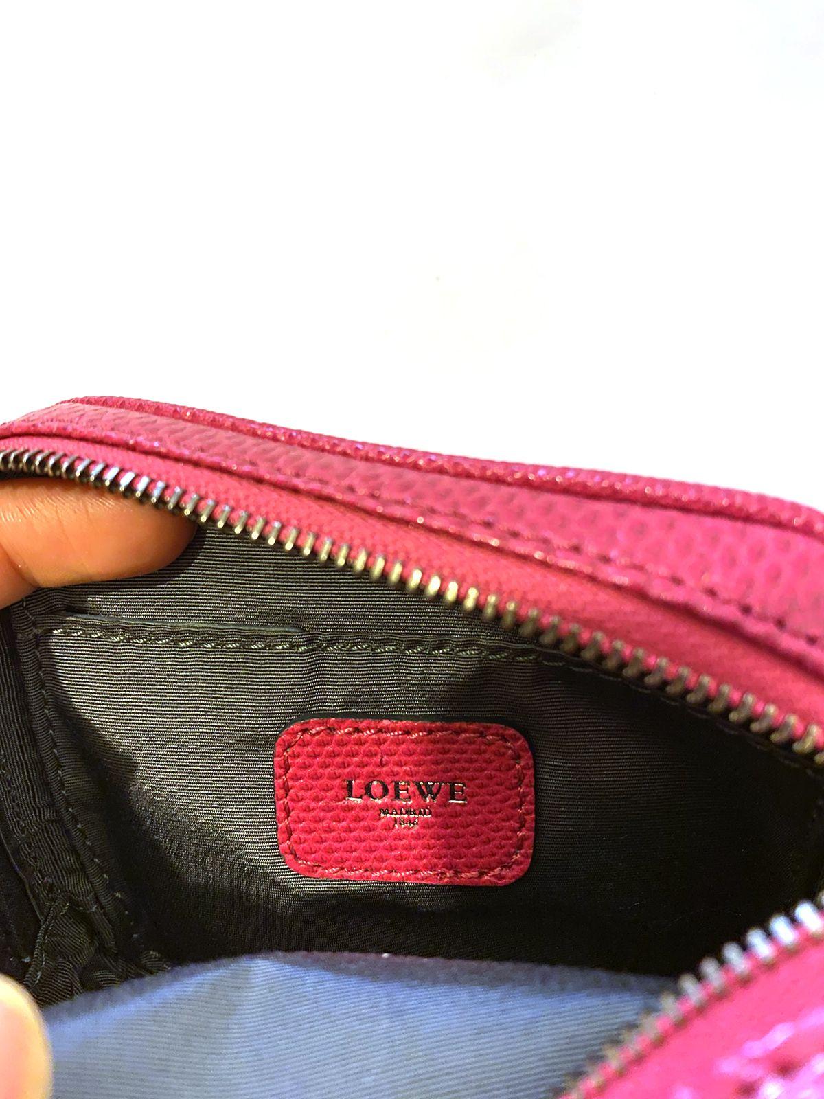 Loewe pink water snake clutch purse with chain