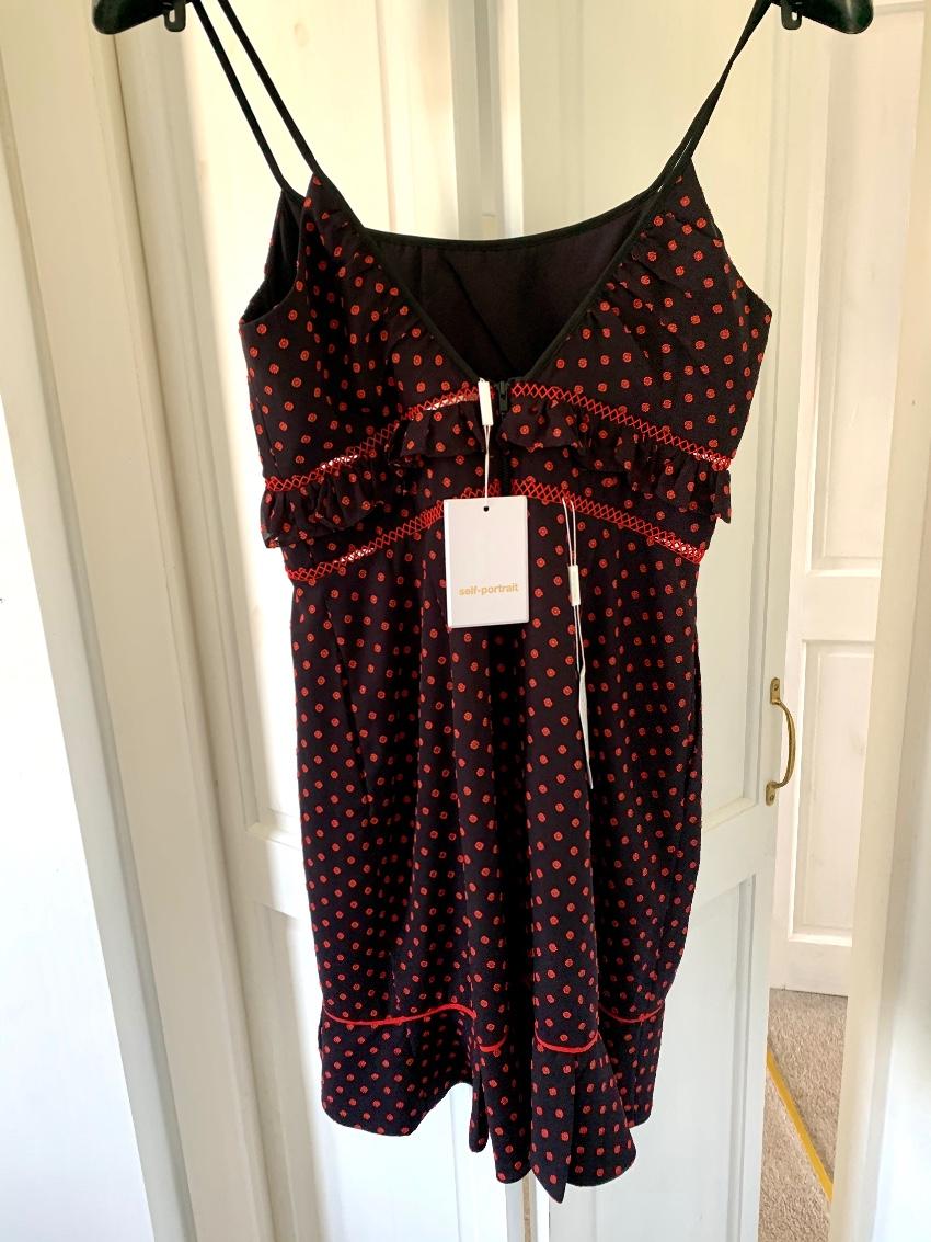 Self Portrait Cut-out frilled mini dress