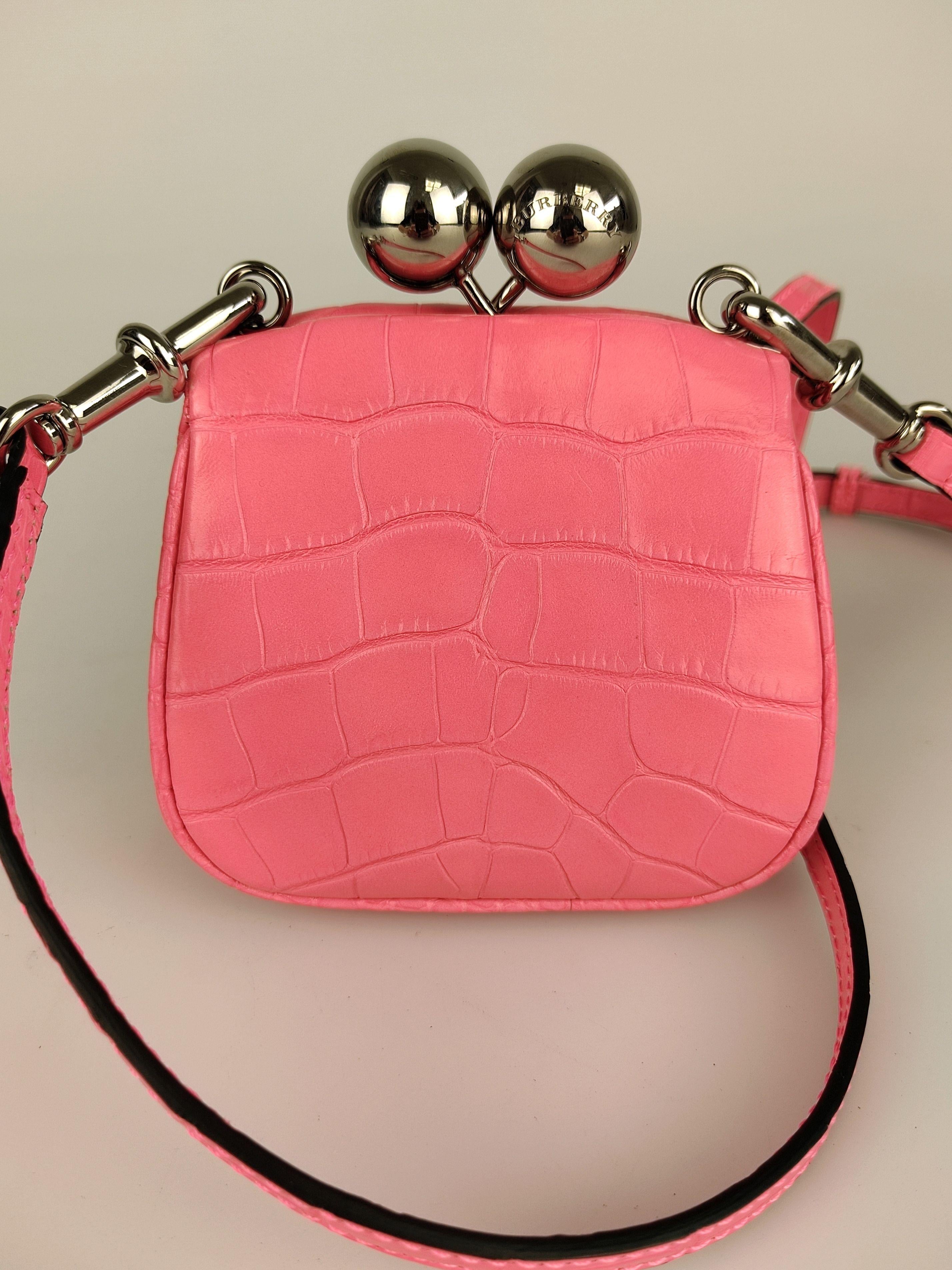 Rose-pink alligator skin mini frame bag