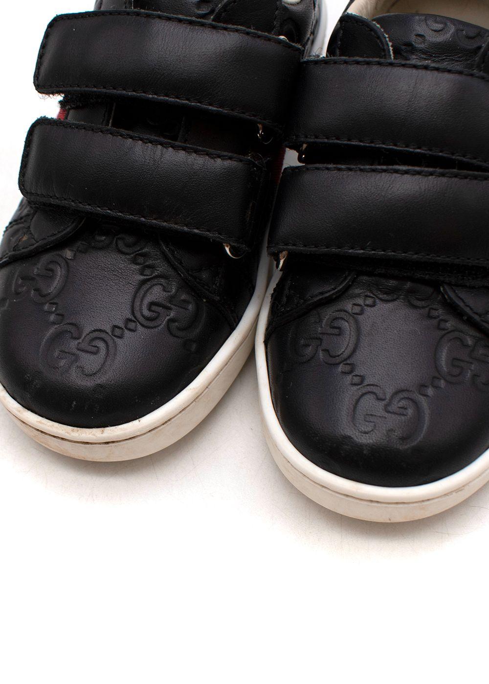 Black GG embossed leather Ace trainers