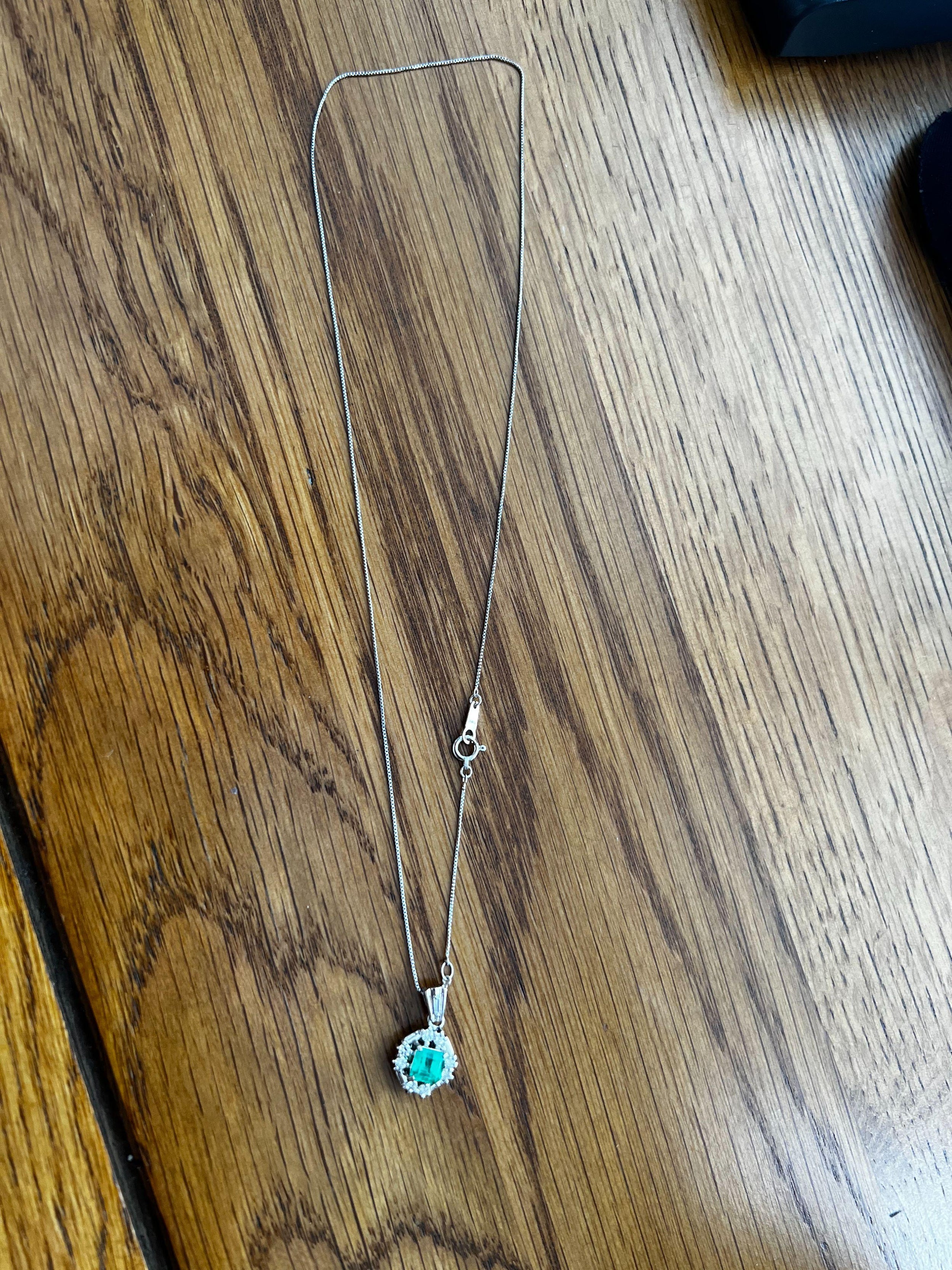Platinum, emerald & diamond pendant necklace