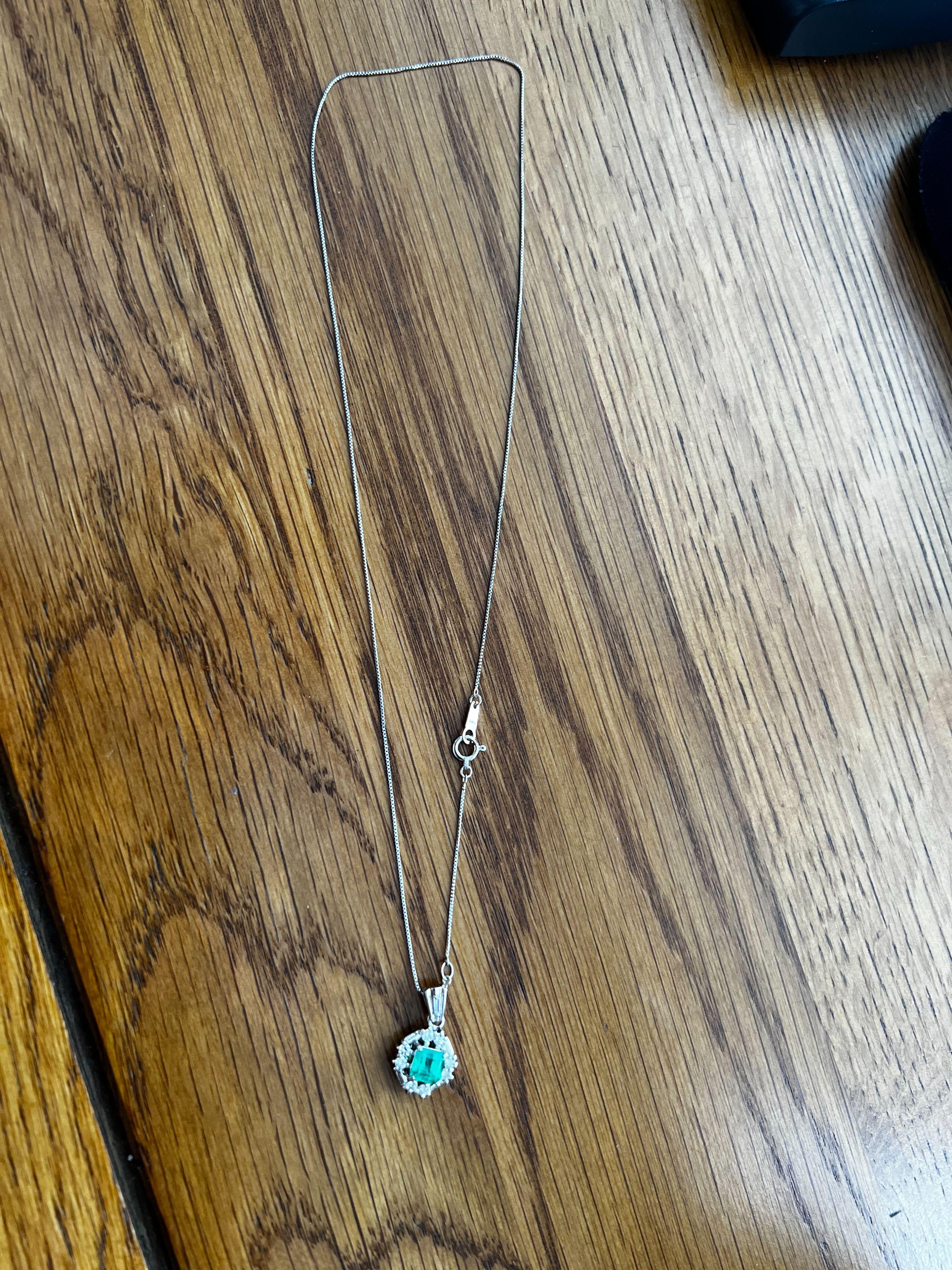 Platinum, emerald & diamond pendant necklace