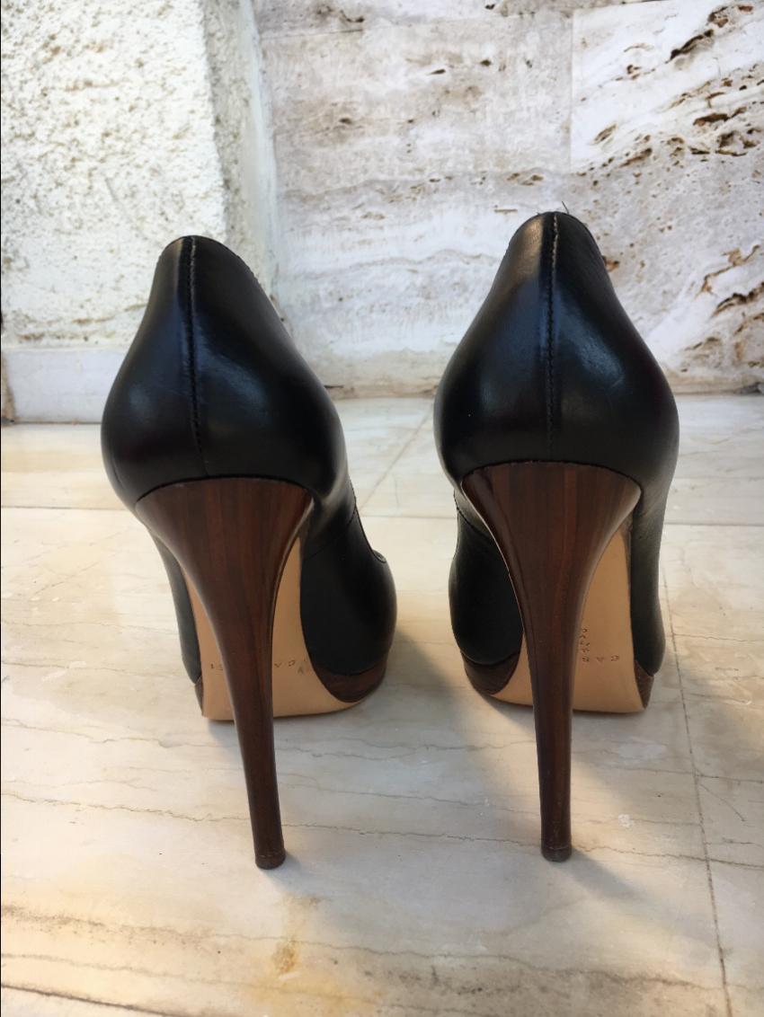 Casadei black leather pumps