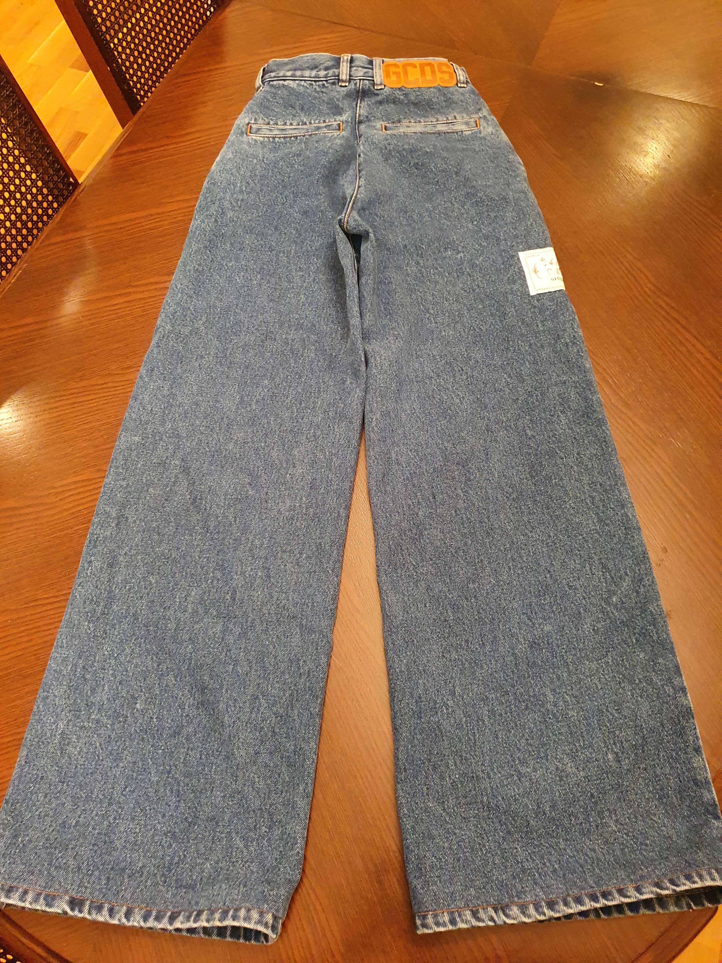Mid-wash denim wide leg jeans