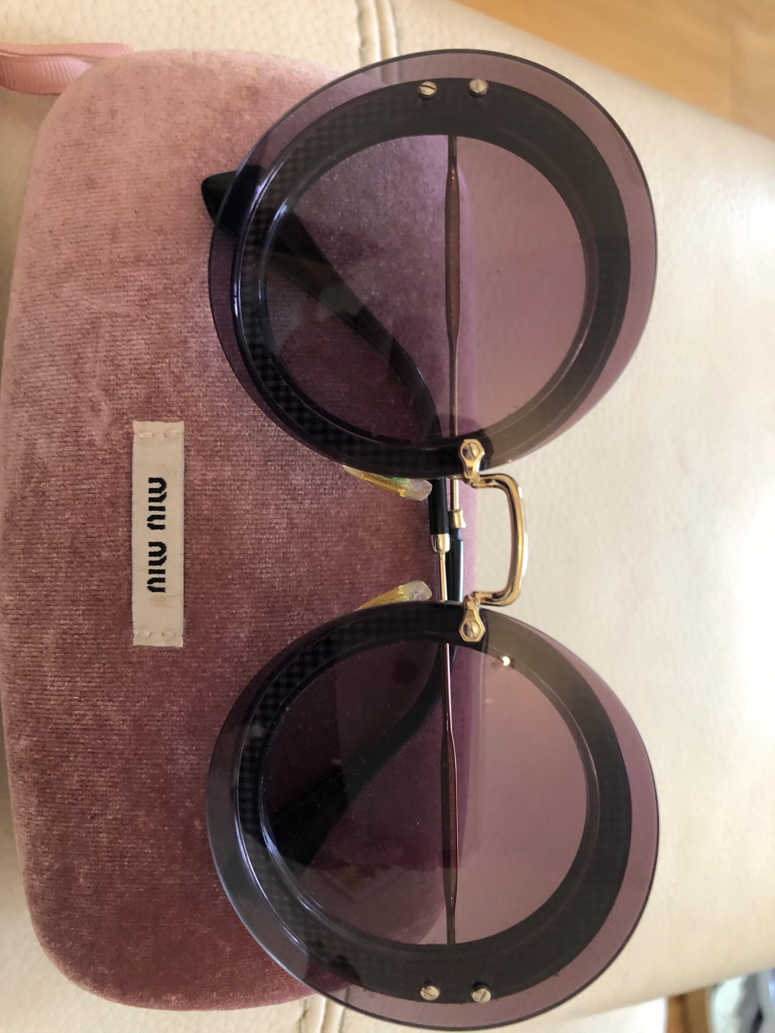 Miu Miu Black Round Sunglasses