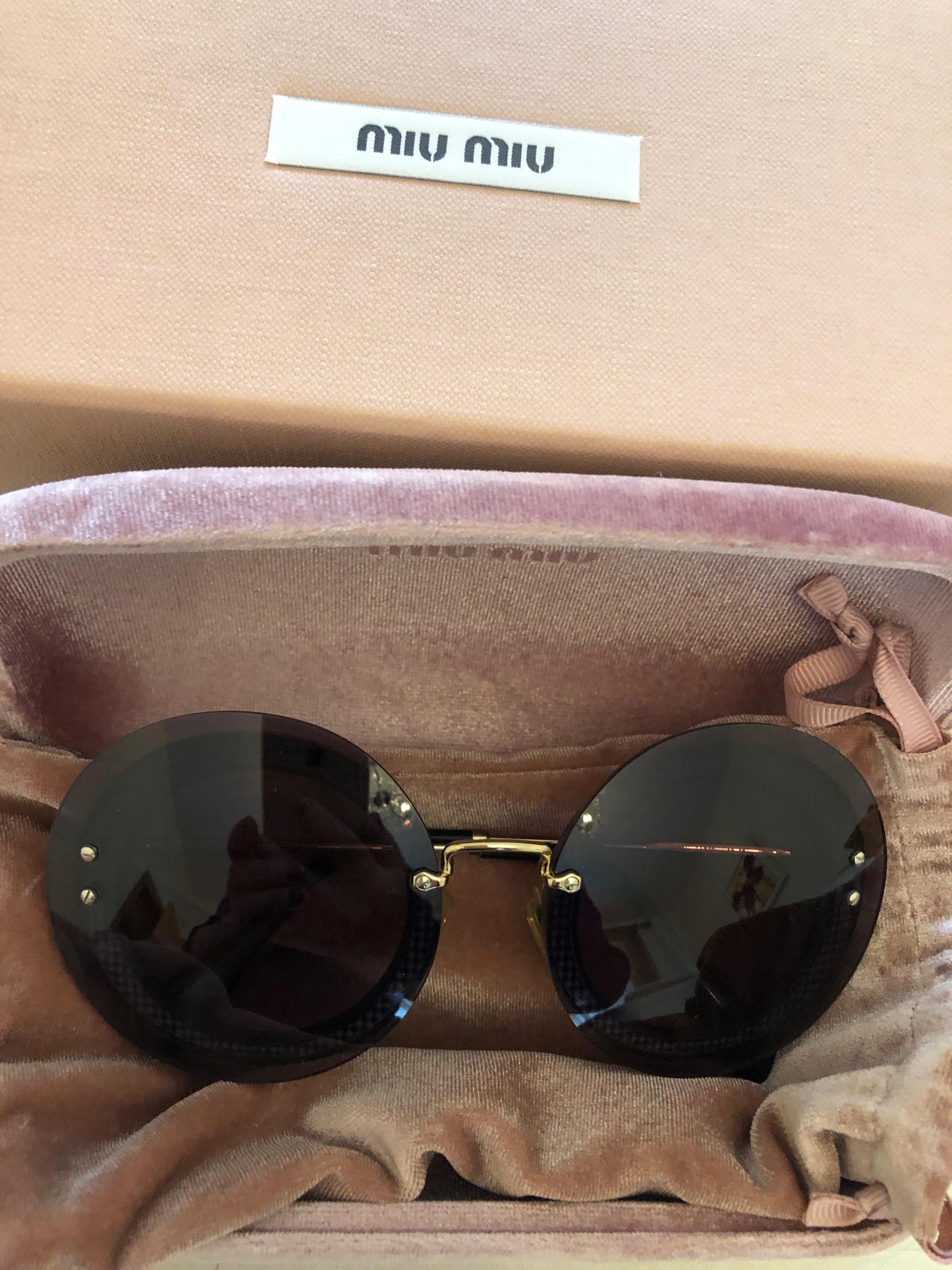 Miu Miu Black Round Sunglasses