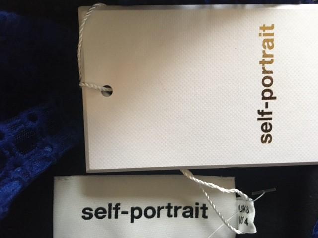 SELF-PORTRAIT Sheer Sleeveless Peplum Top