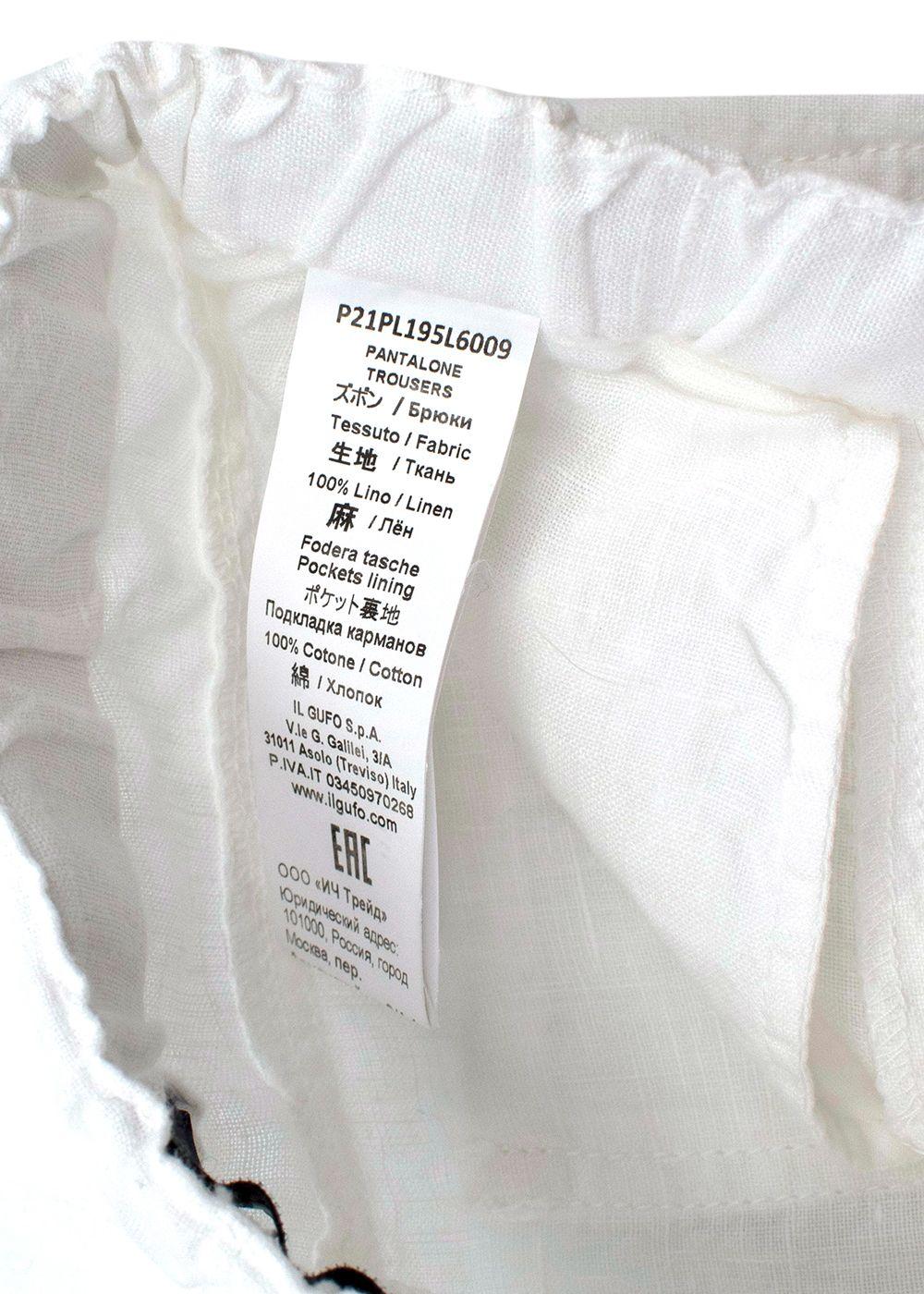 Kids white cotton draw string trousers